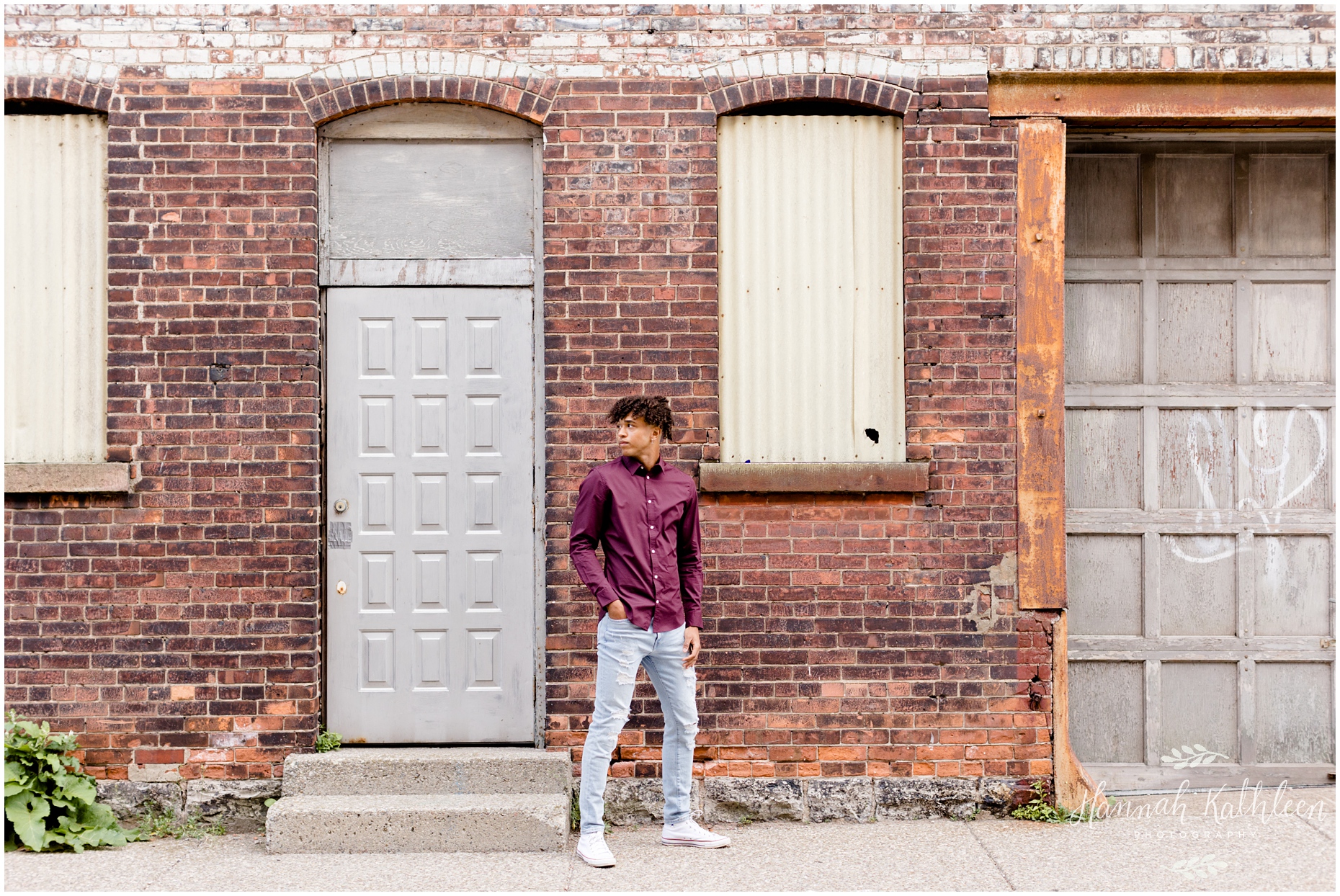 solomon_senior_photographer_downtown_buffalo_new_york_city_hall_urban_industrial_photoshoot_boy