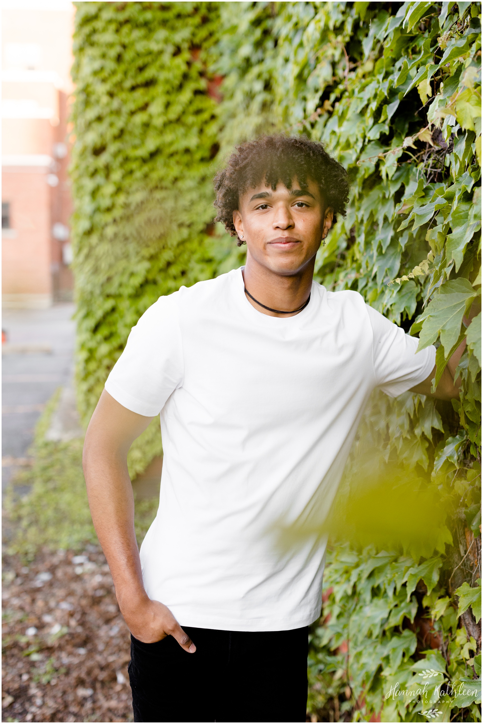 solomon_senior_photographer_downtown_buffalo_new_york_city_hall_urban_industrial_photoshoot_boy