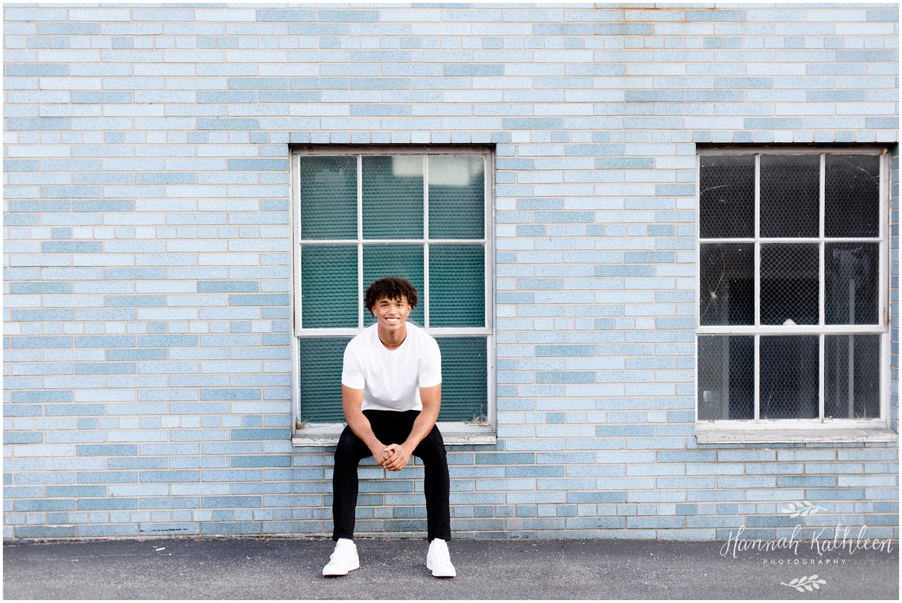 solomon_senior_photographer_downtown_buffalo_new_york_city_hall_urban_industrial_photoshoot_boy